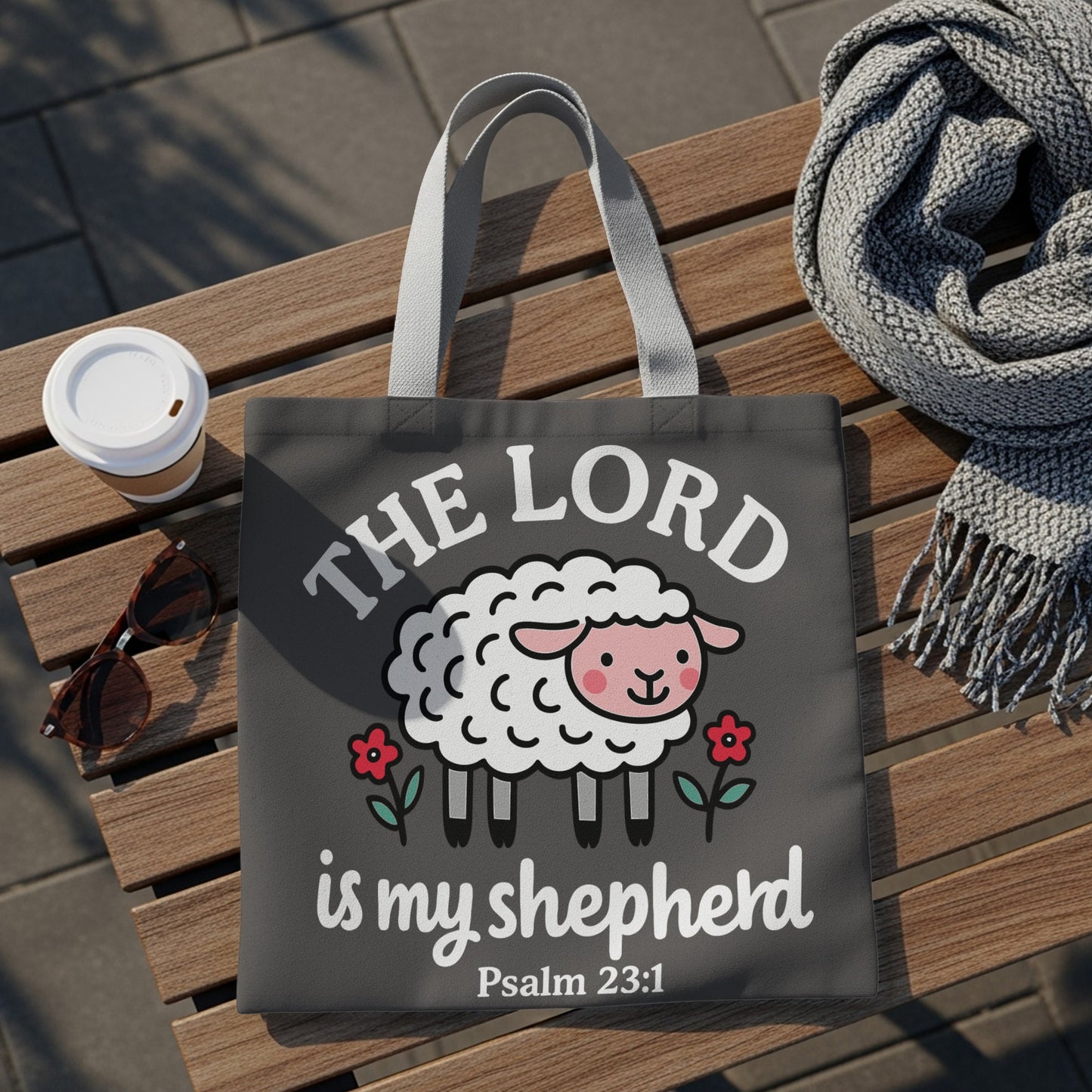 Tote bag with "The Lord is my shepherd Psalm 23:1" text and a cartoon sheep.