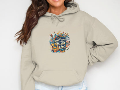 Beige hoodie with "Psalm 150:6 Let Everything That Has Breath Praise The Lord" text and musical instruments.