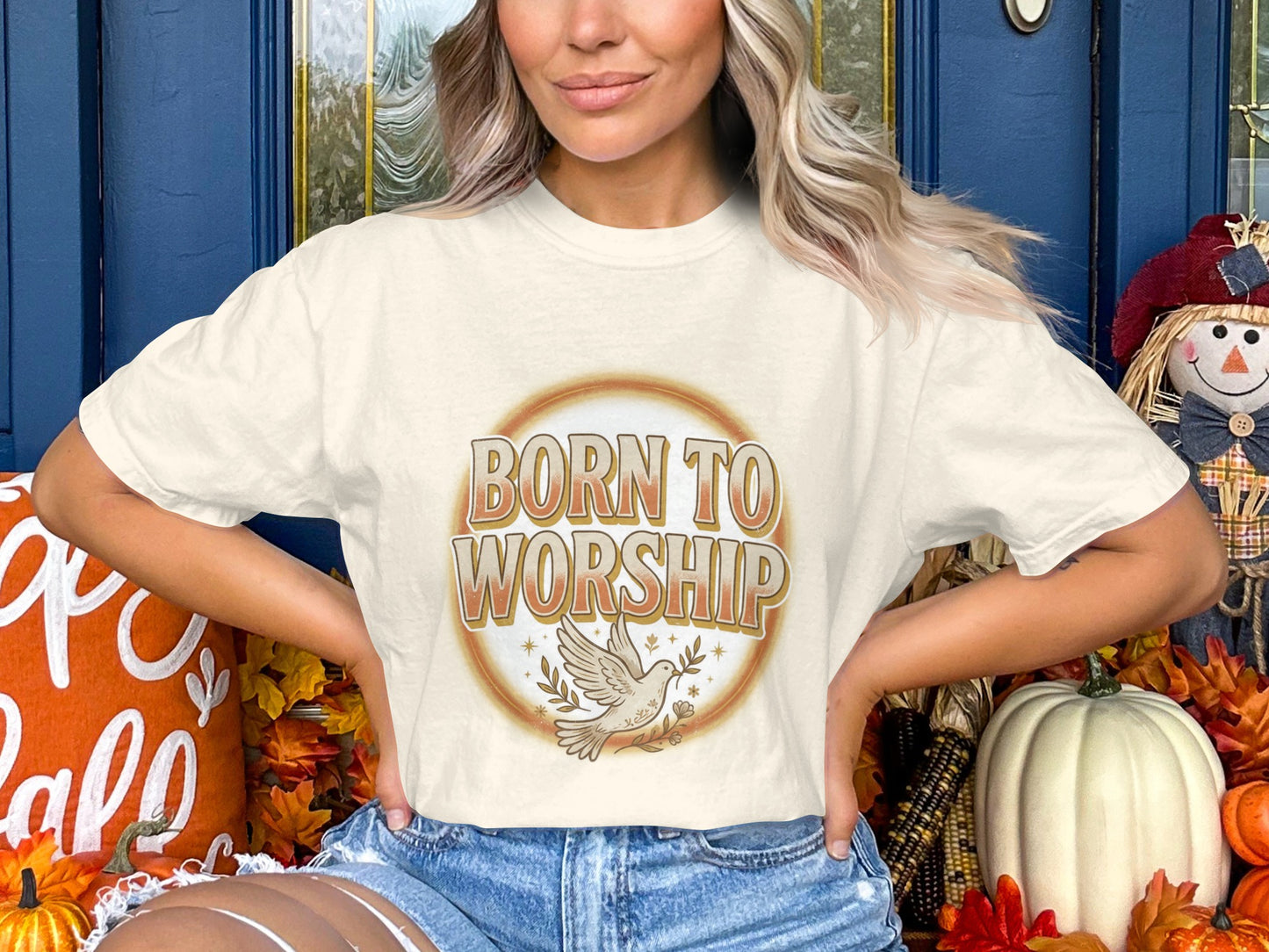 T-shirt with "Born to Worship" text and a dove graphic.