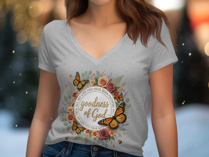 Grey t-shirt with circular floral design, "Goodness of God" text, and butterflies.