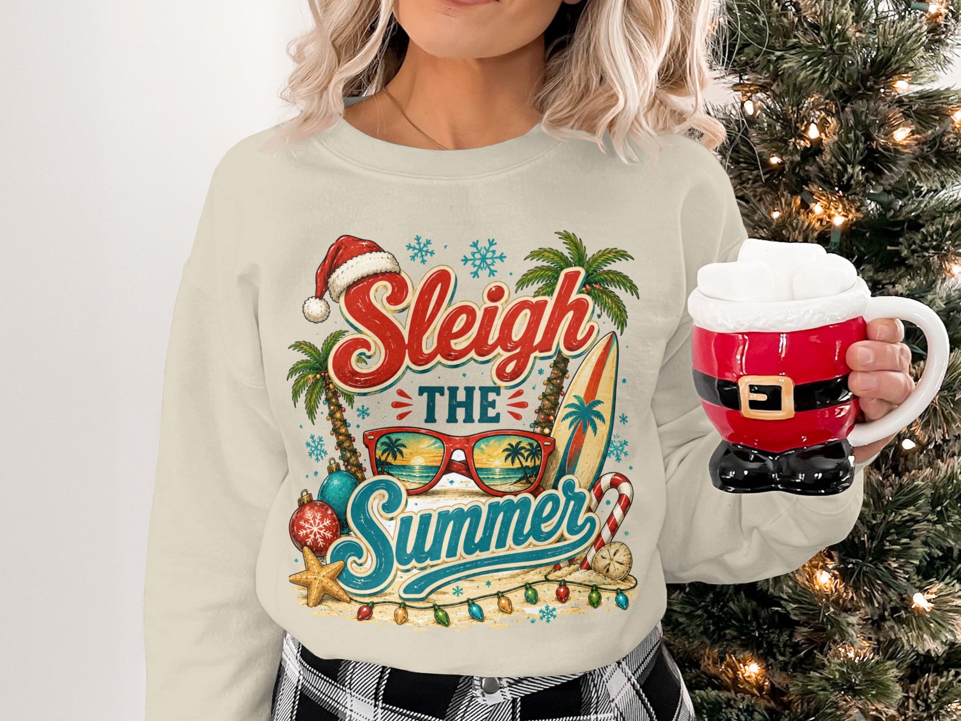 Christmas Santa mug and sweatshirt with "Sleigh the Summer" text and beach graphics.