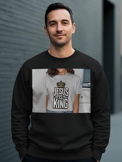 Black crewneck sweatshirt featuring "Jesus Is King" text with a crown graphic.