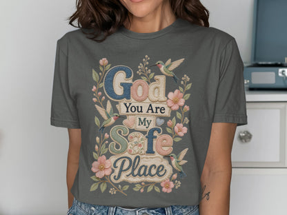 T-shirt with "God You Are My Safe Place" text surrounded by floral accents.