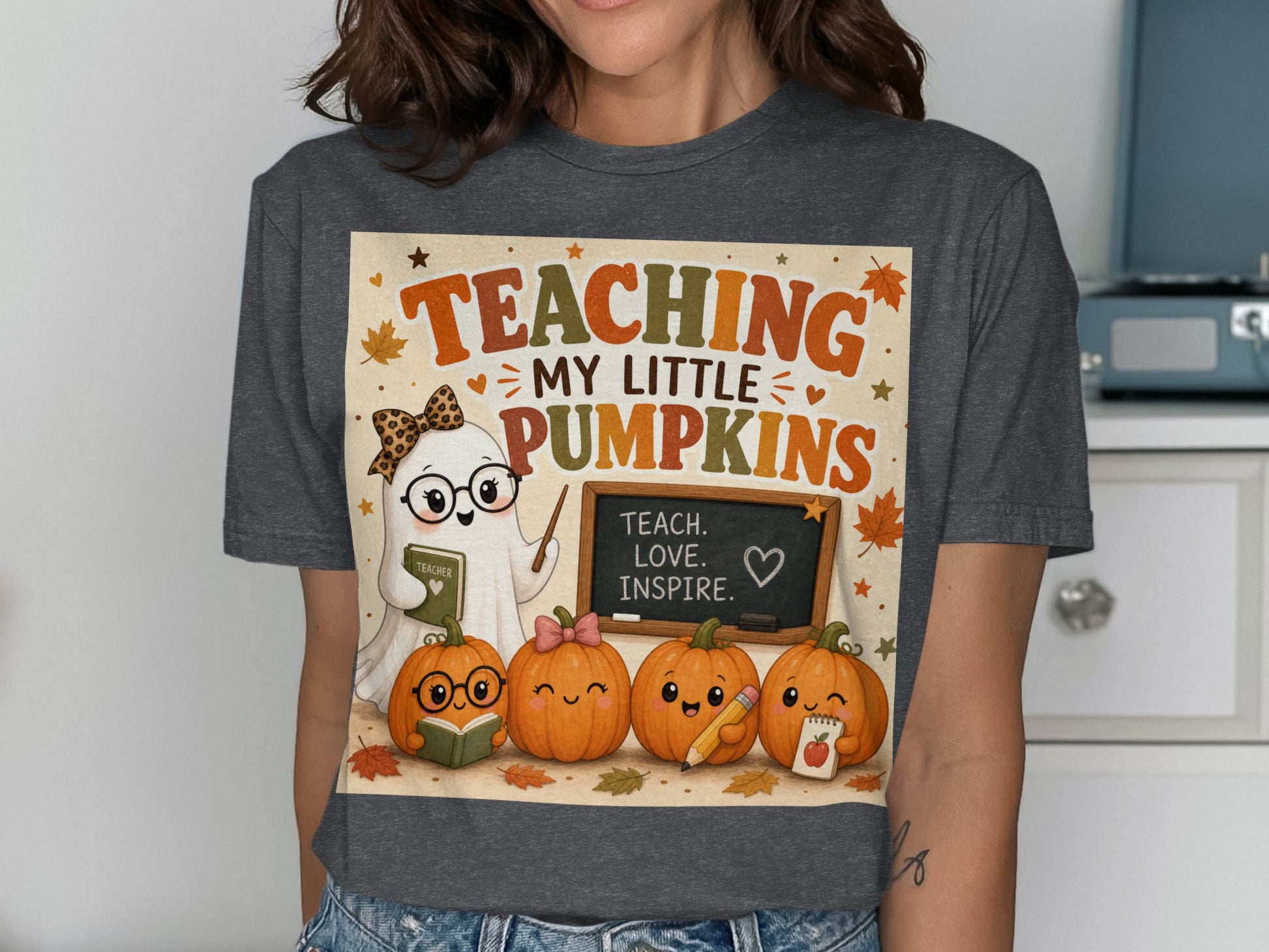 Ghost teacher and pumpkins on shirt saying "Teaching my little pumpkins."