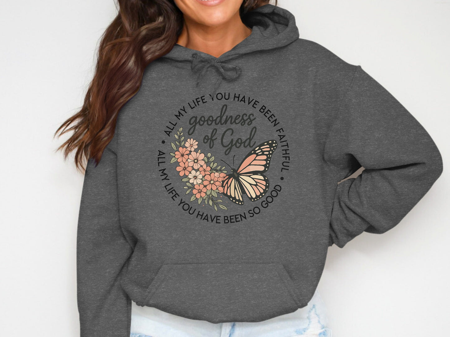 Dark gray hoodie with "All my life you have been faithful, goodness of God" text and butterfly.
