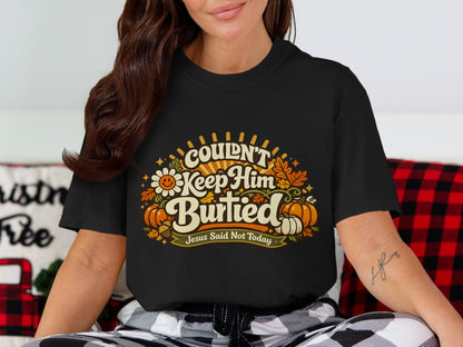 Black t-shirt with retro design: "COULDN'T Keep Him Burtied. Jesus Said Not Today."