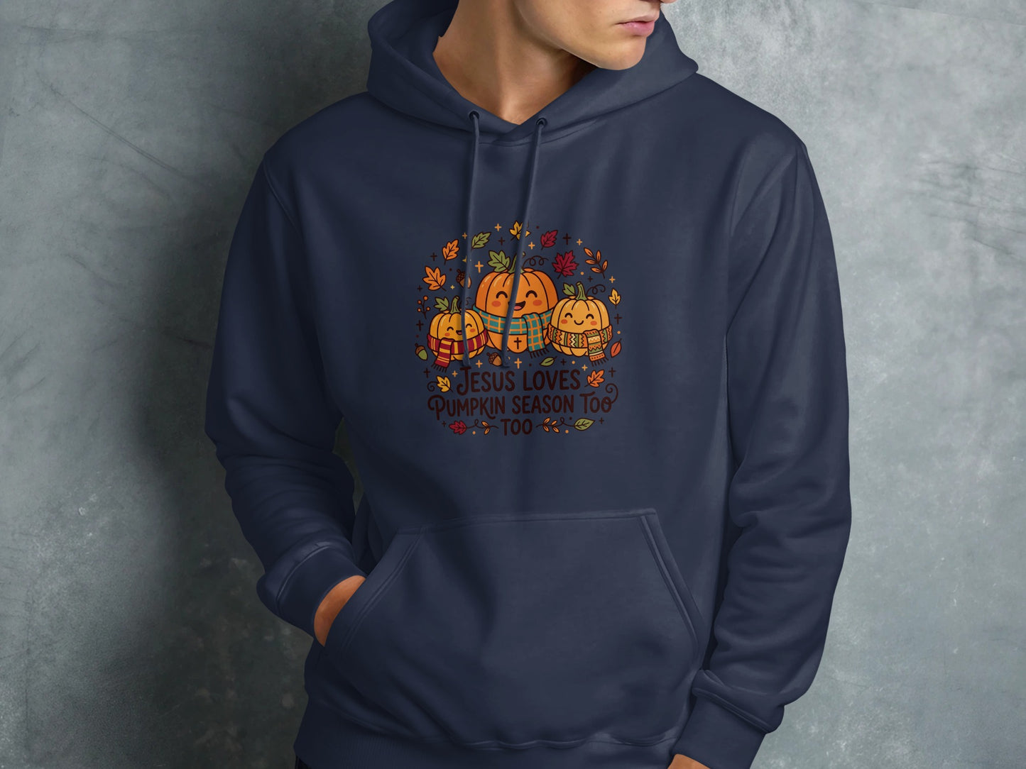Navy hoodie featuring pumpkins with scarves and text "Jesus Loves Pumpkin Season Too".