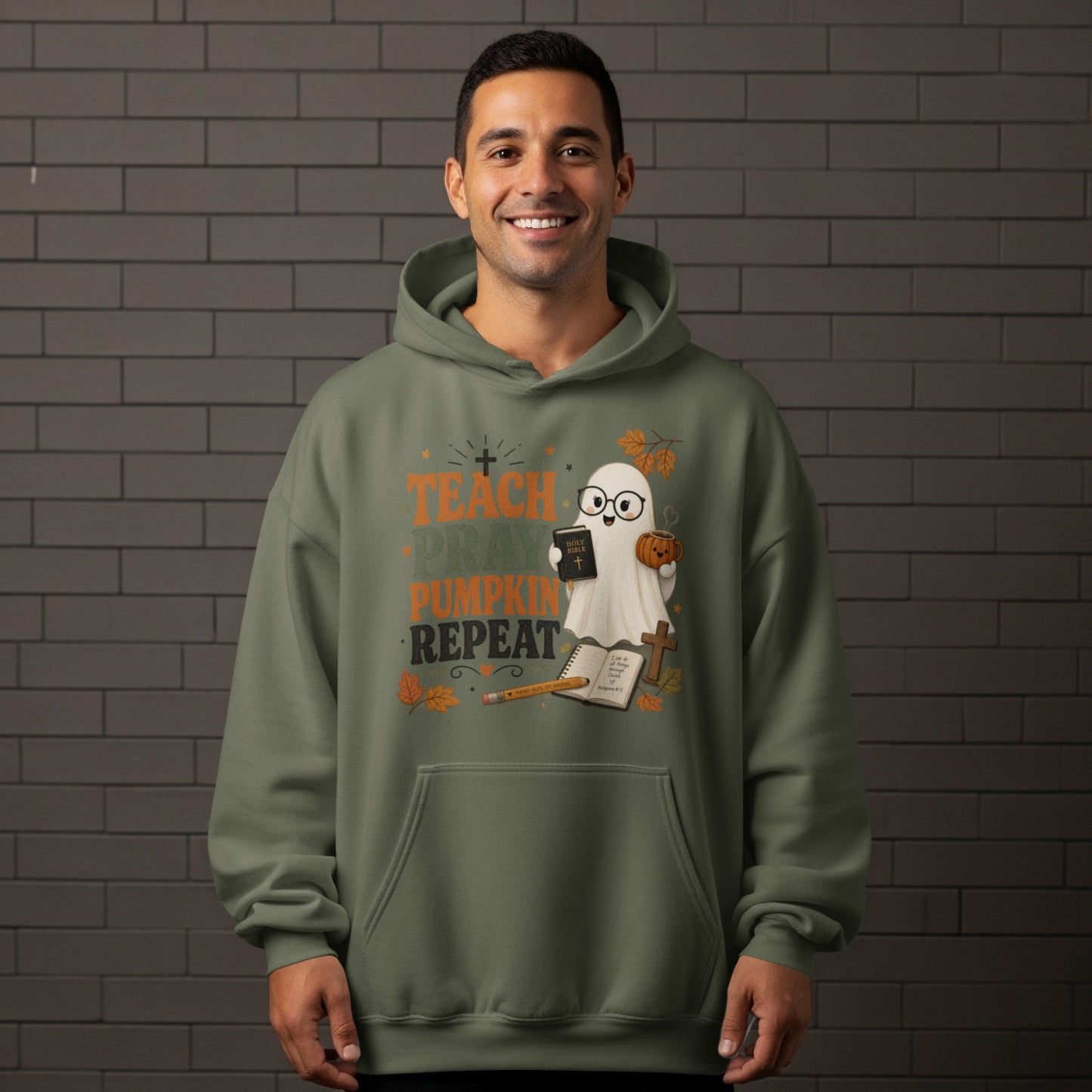 Green hoodie with "Teach Pray Pumpkin Repeat" text and a ghost design.
