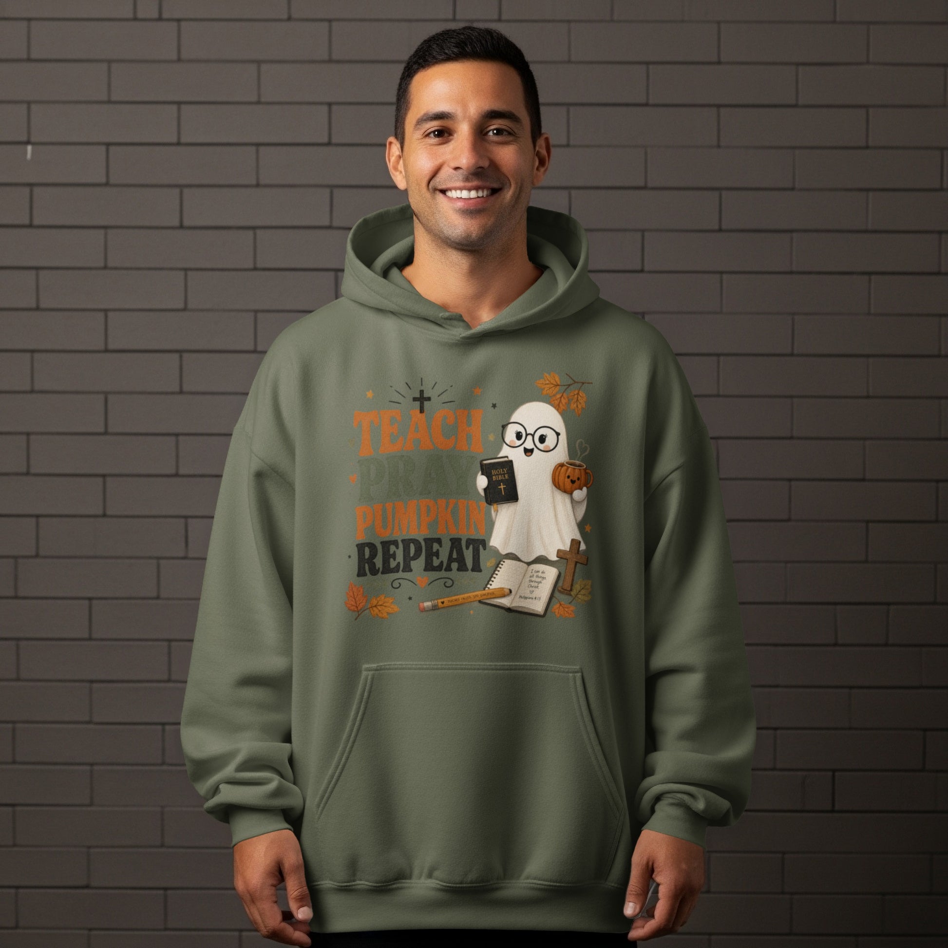 Green hoodie with "Teach Pray Pumpkin Repeat" text and a ghost design.