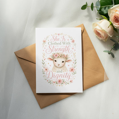 Card with sheep, flowers, and text "She Is Clothed With Strength and Dignity."