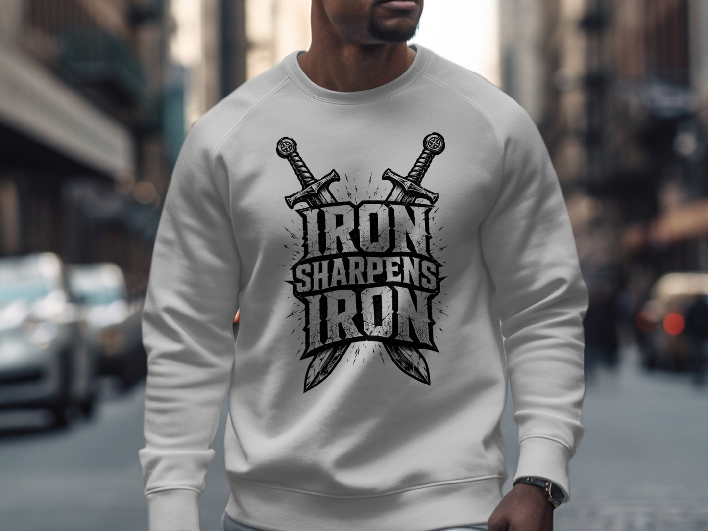 White sweatshirt with crossed swords and "IRON SHARPENS IRON" text.