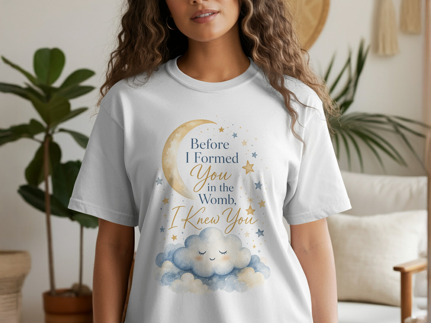 White t-shirt with crescent moon, clouds, and text: "Before I Formed You in the Womb, I Knew You."