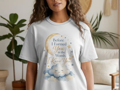 White t-shirt with crescent moon, clouds, and text: "Before I Formed You in the Womb, I Knew You."