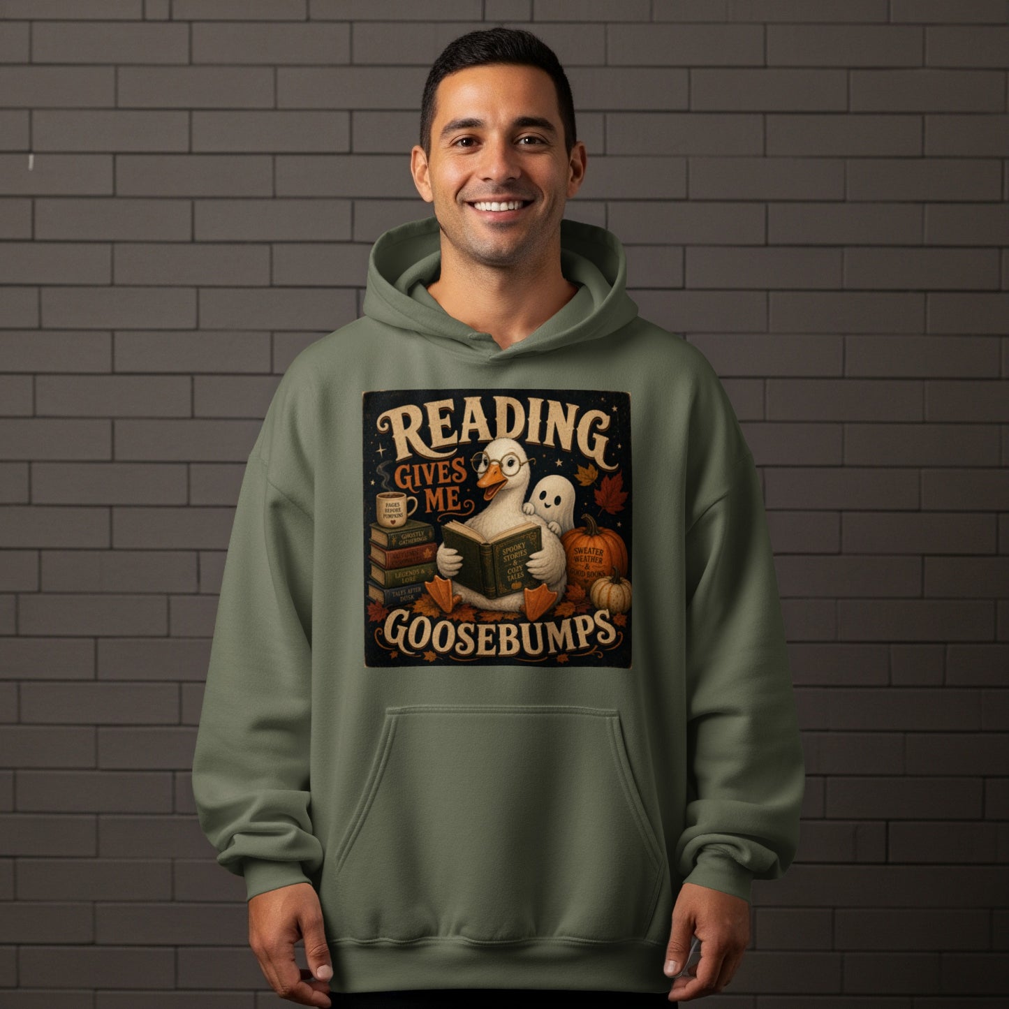 Green hoodie featuring a graphic of a duck reading with text "Reading Gives Me Goosebumps".
