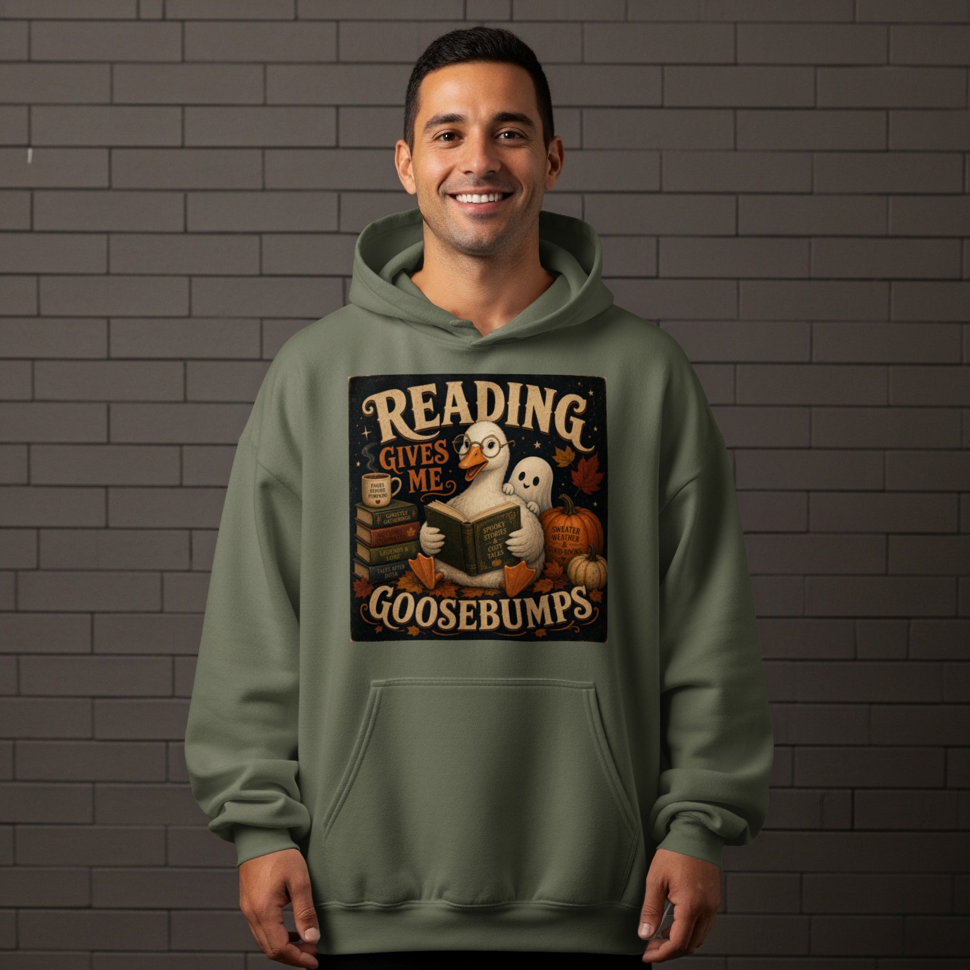 Green hoodie featuring a graphic of a duck reading with text "Reading Gives Me Goosebumps".