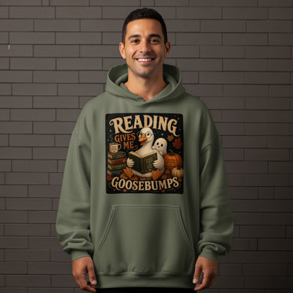 Green hoodie featuring a graphic of a duck reading with text "Reading Gives Me Goosebumps".