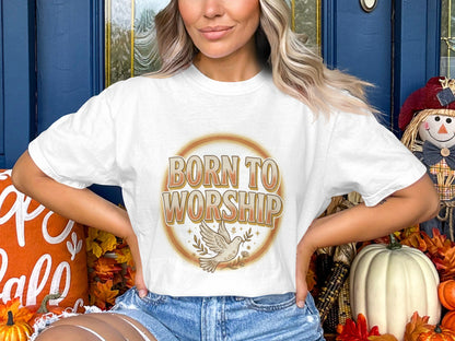 White t-shirt with "BORN TO WORSHIP" text and a dove with olive branch emblem.