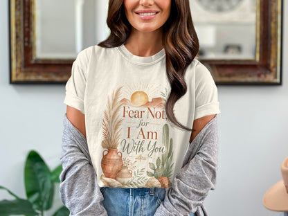 Cream t-shirt with "Fear Not, for I Am With You" text and desert scene.