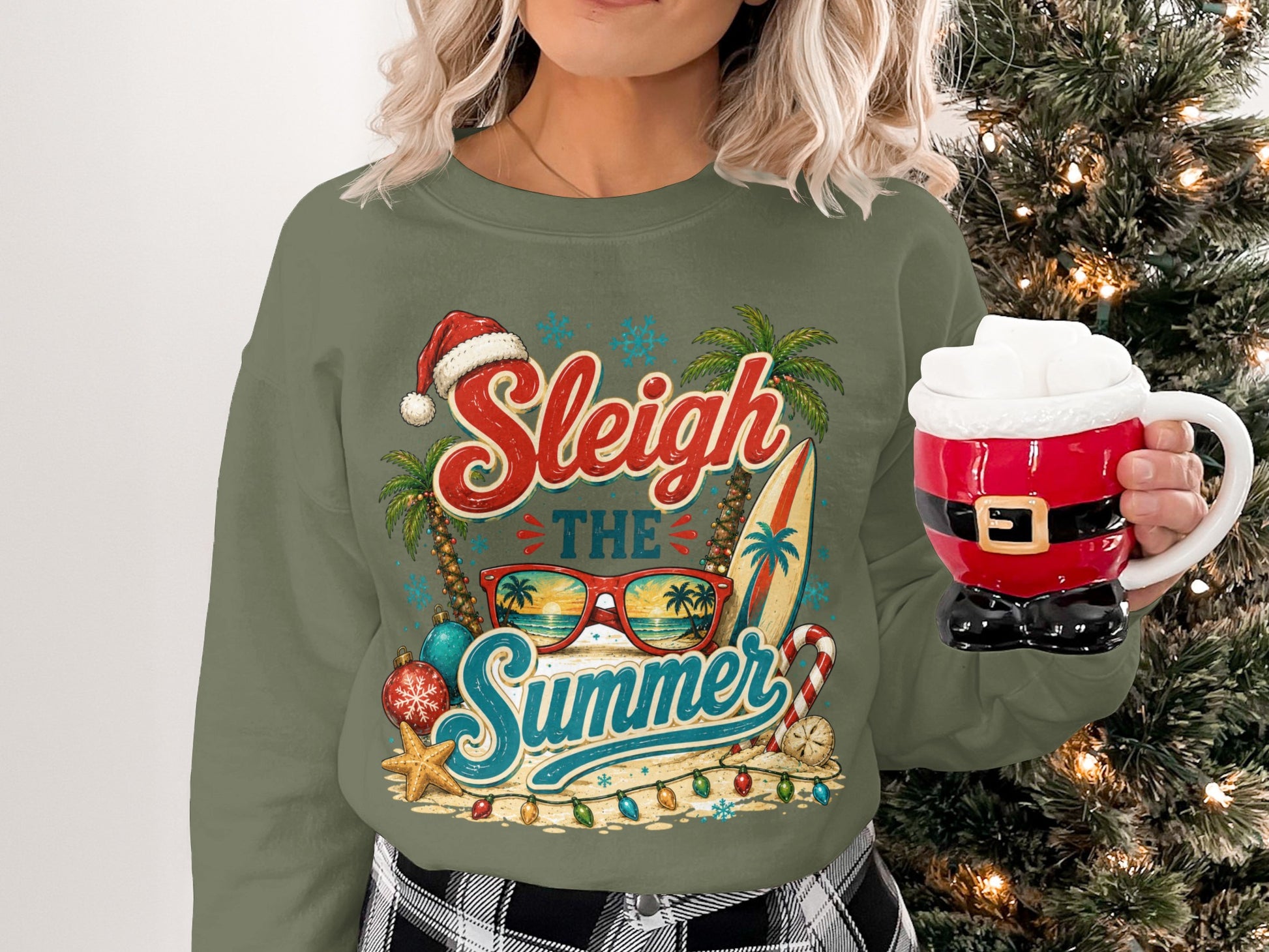 Woman wearing a "Sleigh the Summer" holiday sweatshirt with beach-themed graphics.