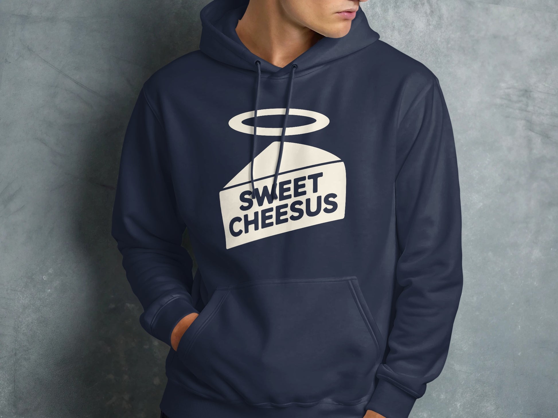 Navy hoodie with a slice of cheese with halo graphic and "SWEET CHEESUS" text.