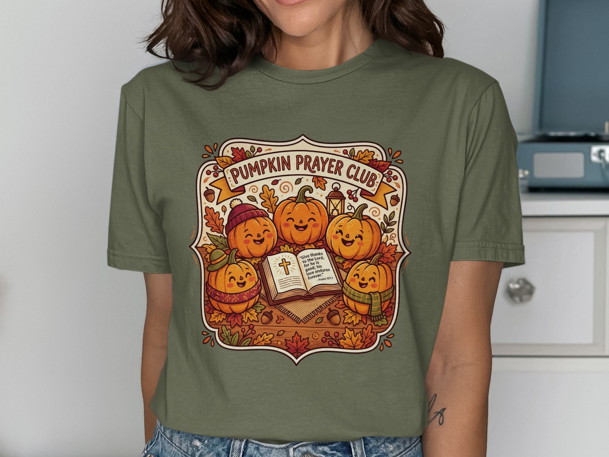 Pumpkin Prayer Club tee with smiling pumpkins reading Bible.