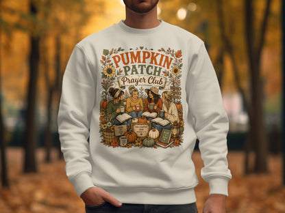 Crewneck sweatshirt with "Pumpkin Patch Prayer Club" graphic and fall imagery.