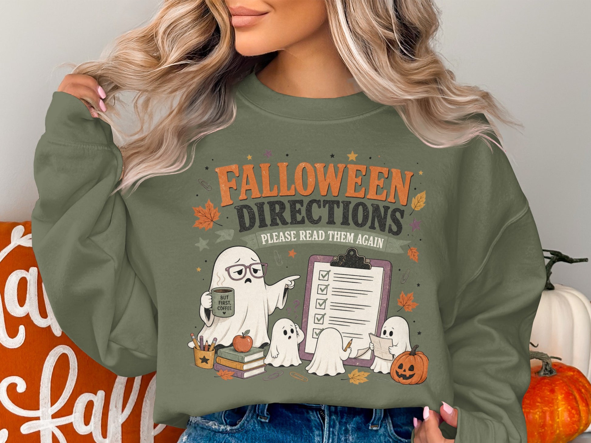 Green sweatshirt with "Falloween Directions Please Read Them Again" and ghosts.