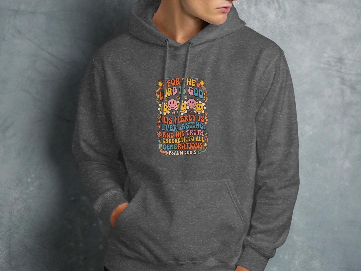 Dark grey hoodie with Psalm 100:5 text and colorful retro graphics.