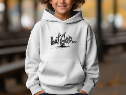 White hoodie with "But God..." in black sketched text.