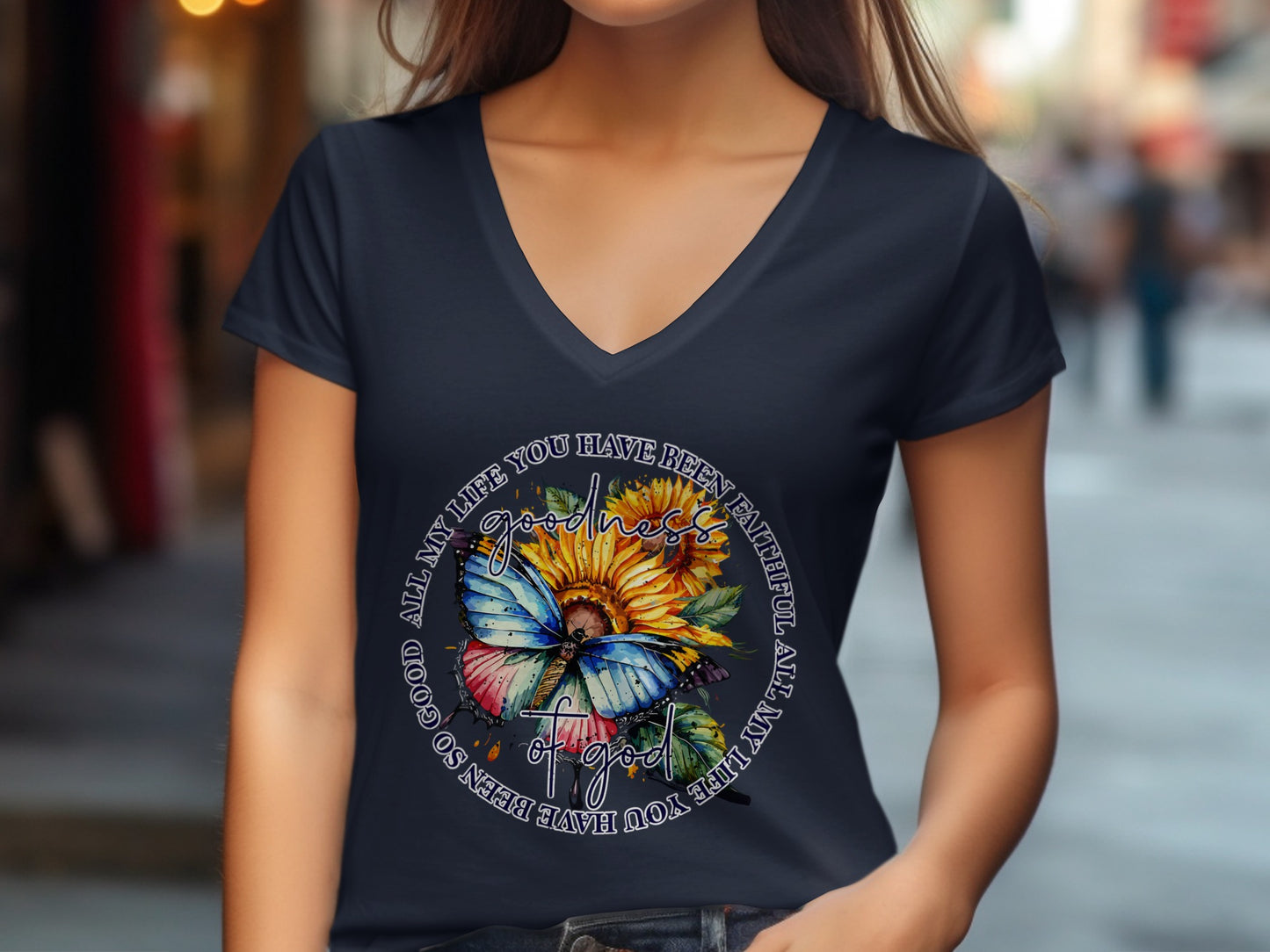 Dark blue v-neck t-shirt with a sunflower, butterfly, and scripture.