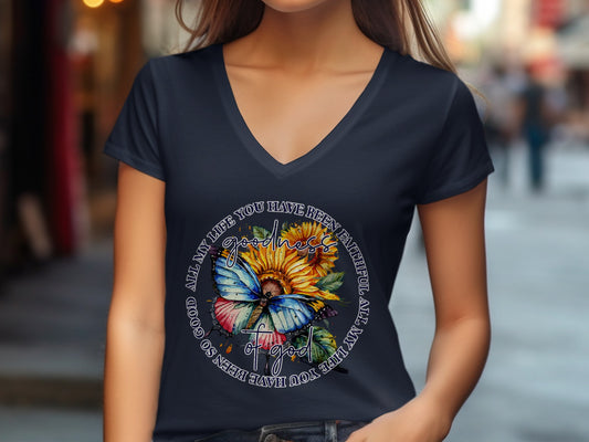 Dark blue v-neck t-shirt with a sunflower, butterfly, and scripture.