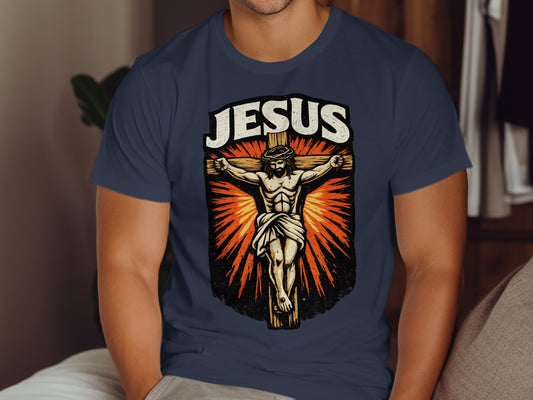 Jesus crucifixion graphic with "JESUS" text on a navy t-shirt.