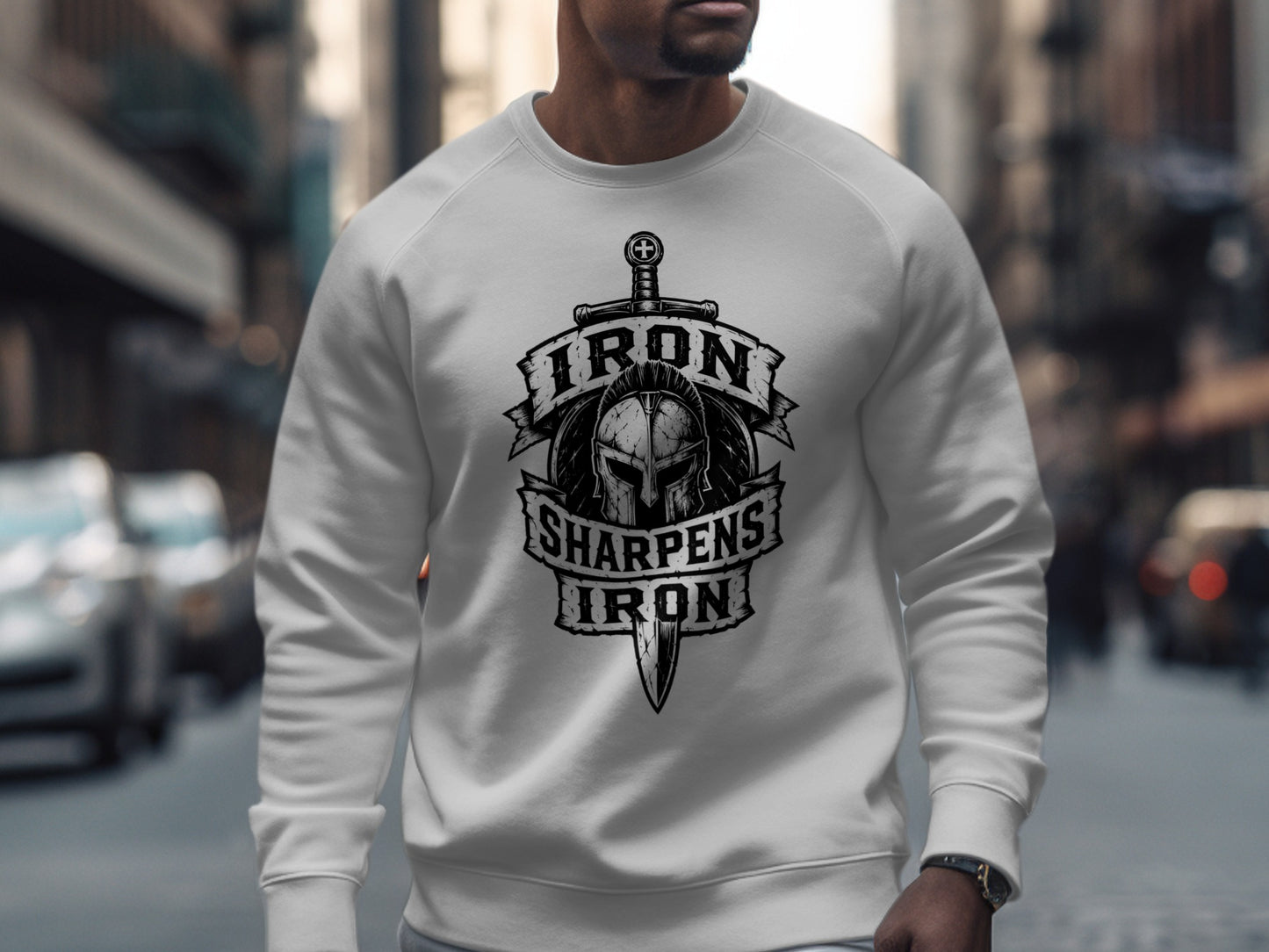 White crewneck sweatshirt with "Iron Sharpens Iron" text and helmet graphic.