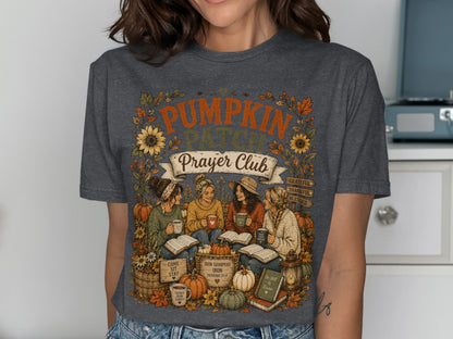 Dark t-shirt with "Pumpkin Prayer Club" and autumn illustrations.