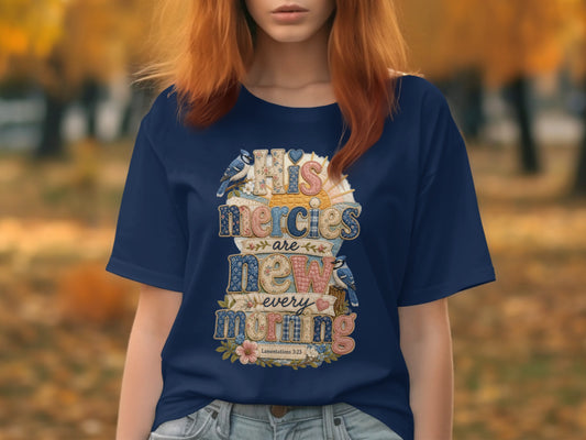 Navy t-shirt with "HIS mercies are new every morning" text and floral accents.