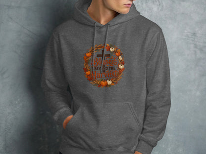 Gray hoodie with "Blessed Beyond the Harvest" text and autumn wreath graphic.
