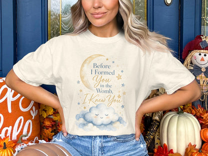 Cream t-shirt with text "Before I Formed You in the Womb, I Knew You" and cloud graphic.