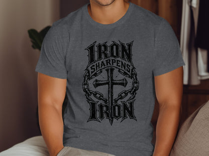 Dark gray t-shirt with "Iron Sharpens Iron" text and a cross emblem.