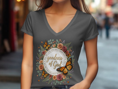 Gray V-neck t-shirt with floral wreath and butterflies, featuring "Goodness of God."