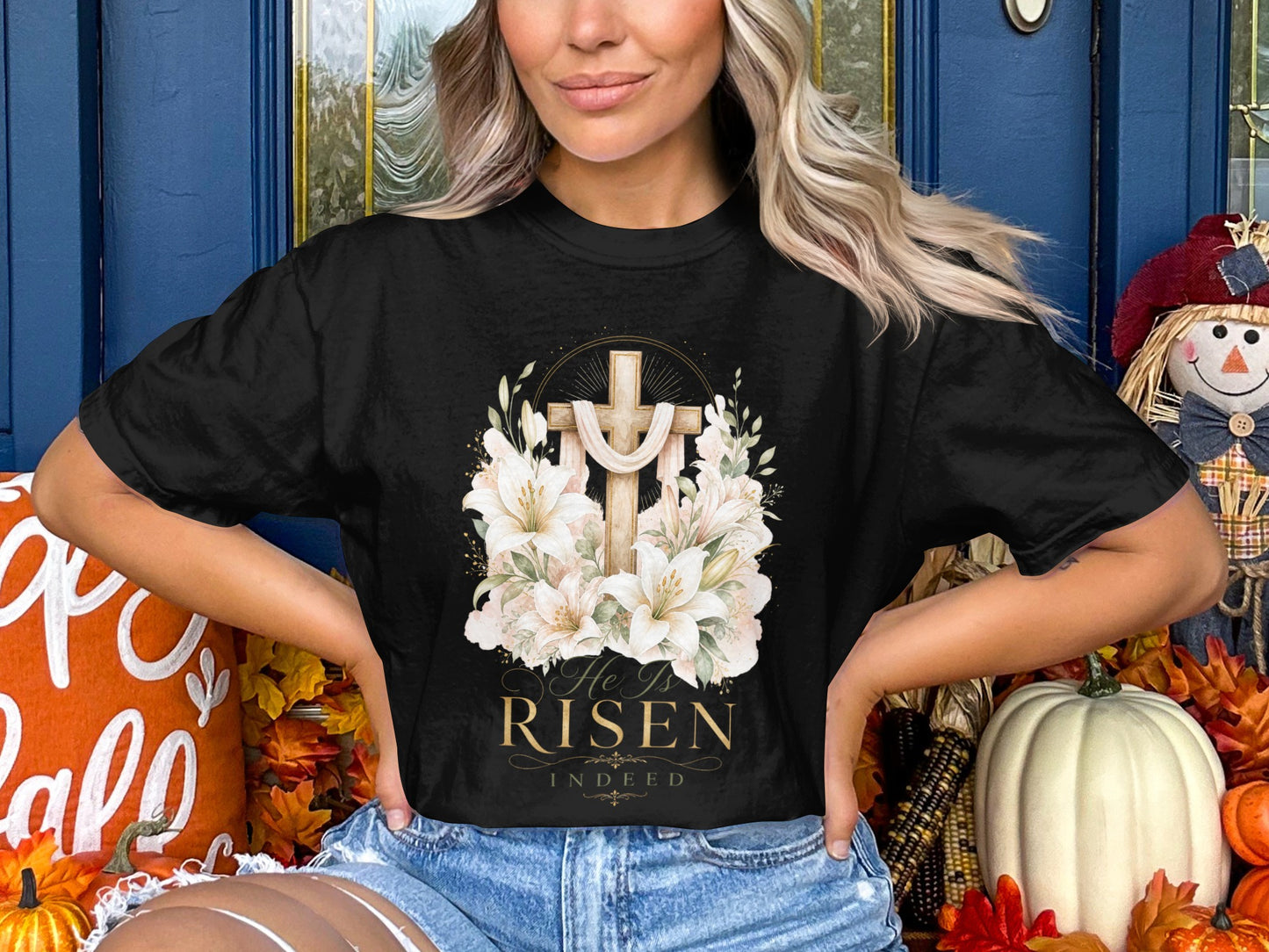 Black t-shirt with a cross, flowers, and text "He Is Risen Indeed".