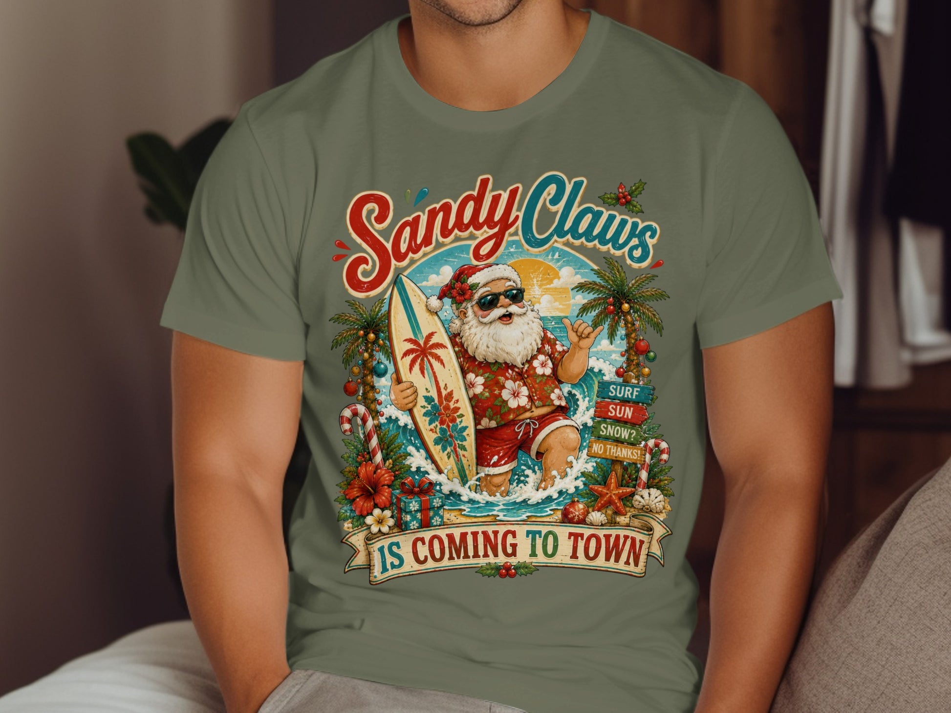 Santa Claus on a surfboard with "Sandy Claws" text.