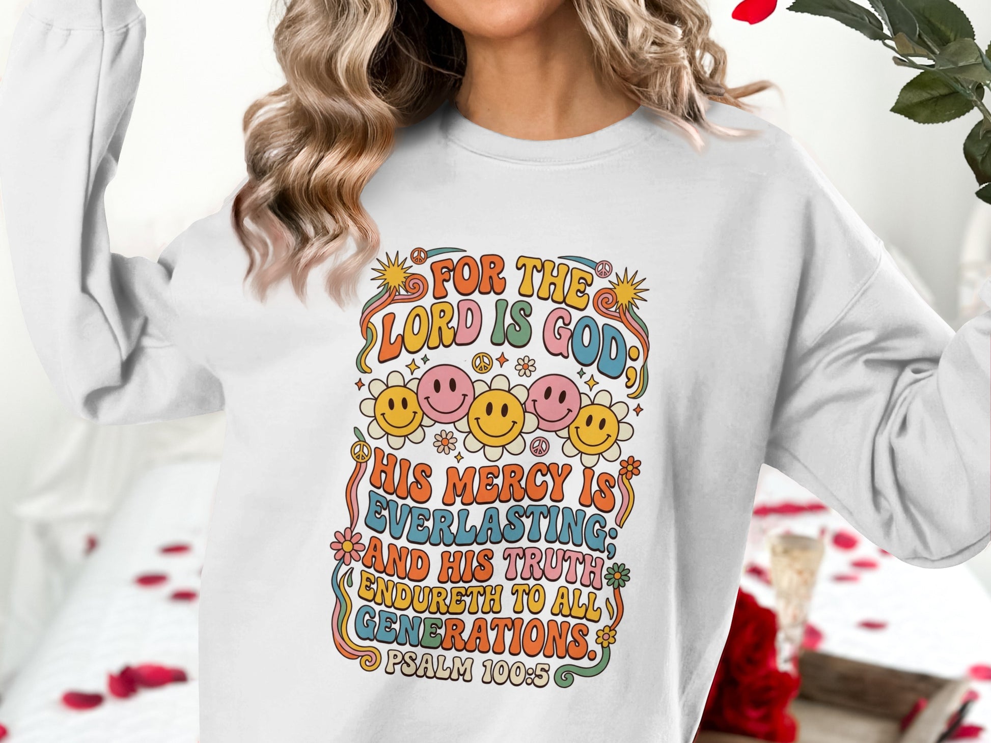 White sweatshirt with "For the Lord is God" and Psalm 100:5 text.