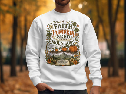 White sweatshirt with "Faith Like a Pumpkin Seed" design and Bible verse.