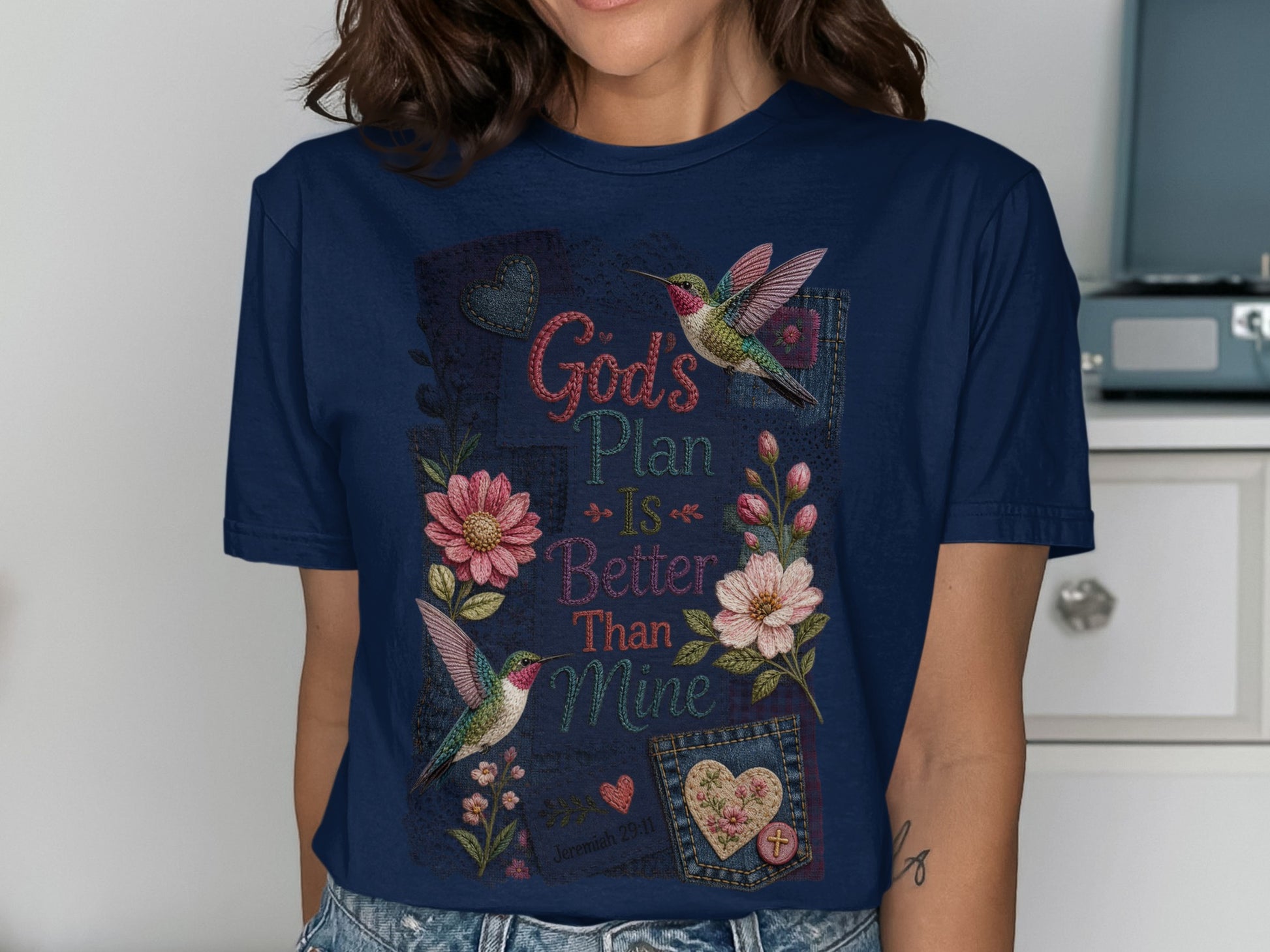 Navy t-shirt with "God's Plan is Better Than Mine" and hummingbirds.