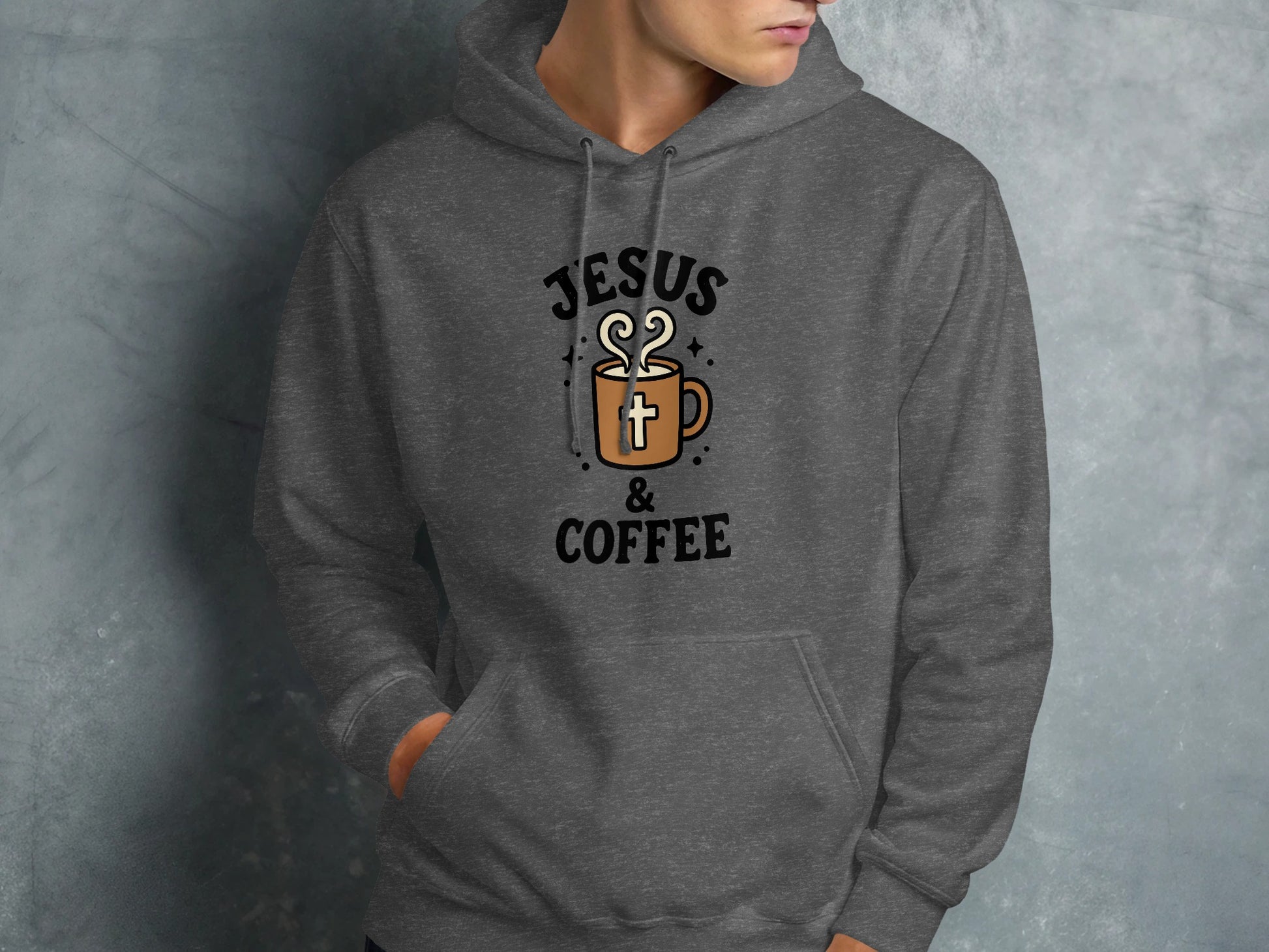 Dark gray hoodie with "Jesus & Coffee" text and a coffee mug graphic.
