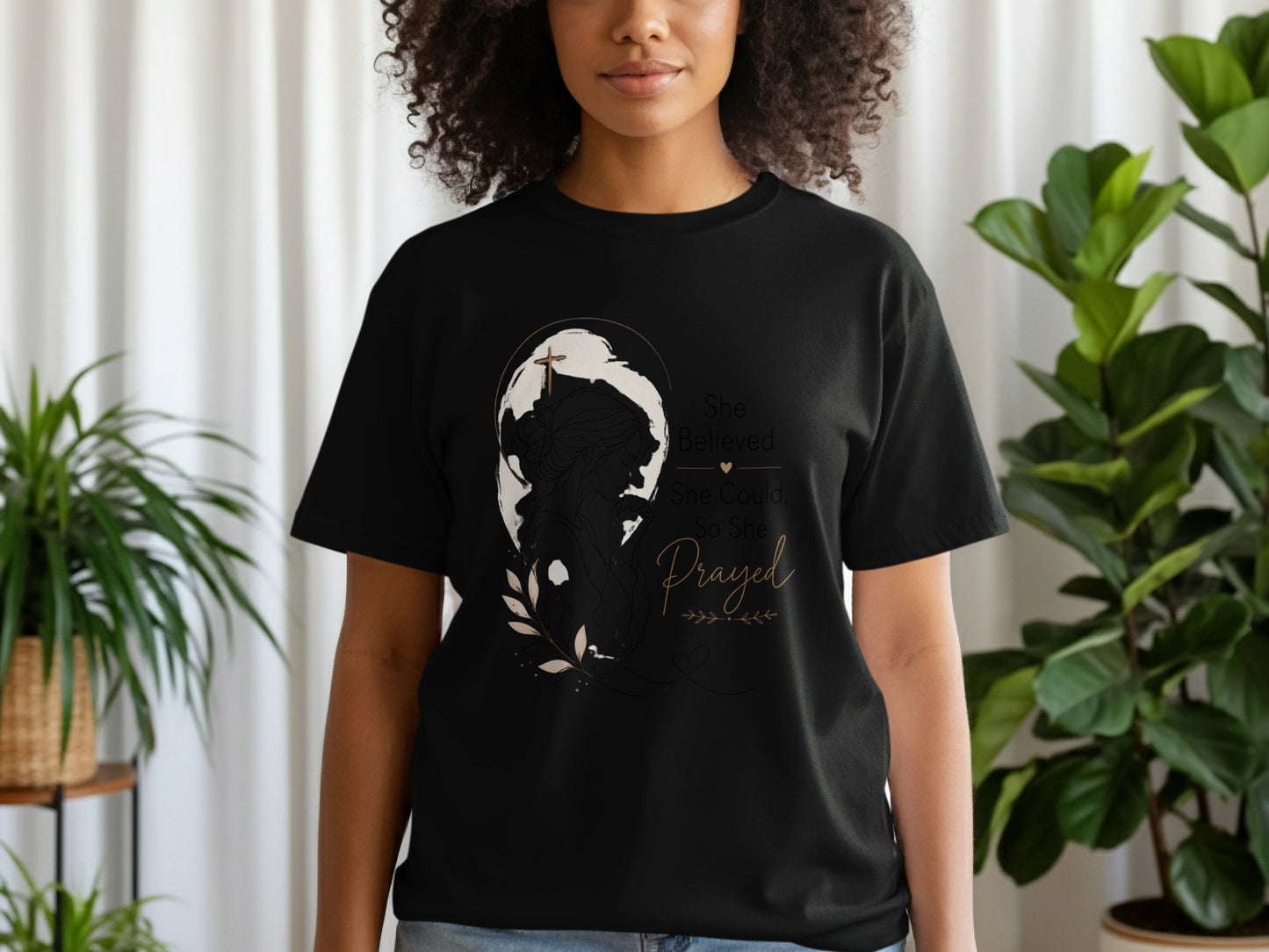 Black t-shirt with graphic: "She Believed, She Could, So She Prayed."