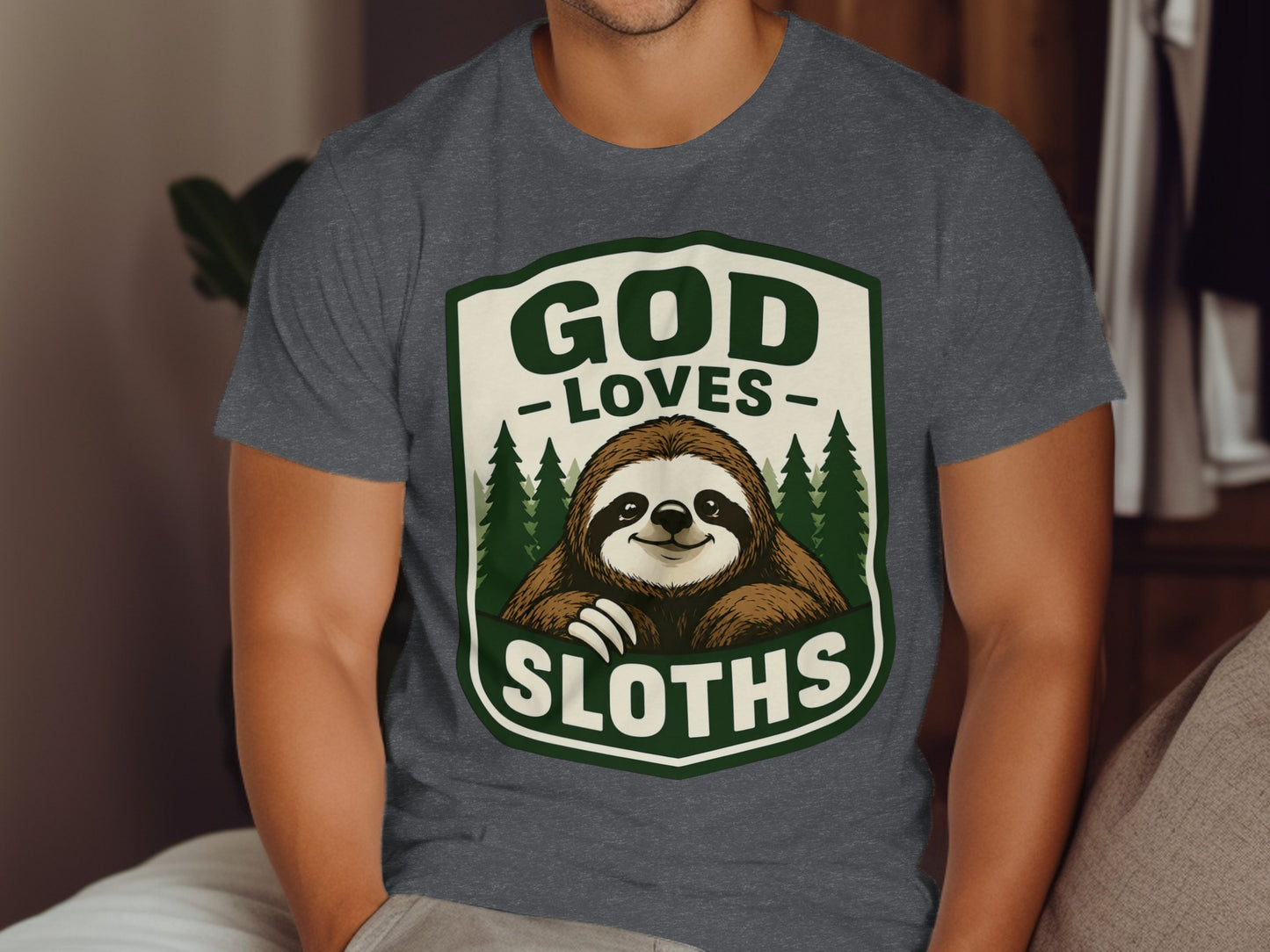 T-shirt featuring a sloth in a shield with "GOD LOVES SLOTHS" text.