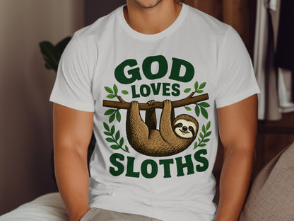 White t-shirt with "God Loves Sloths" text and a sloth hanging from a branch.
