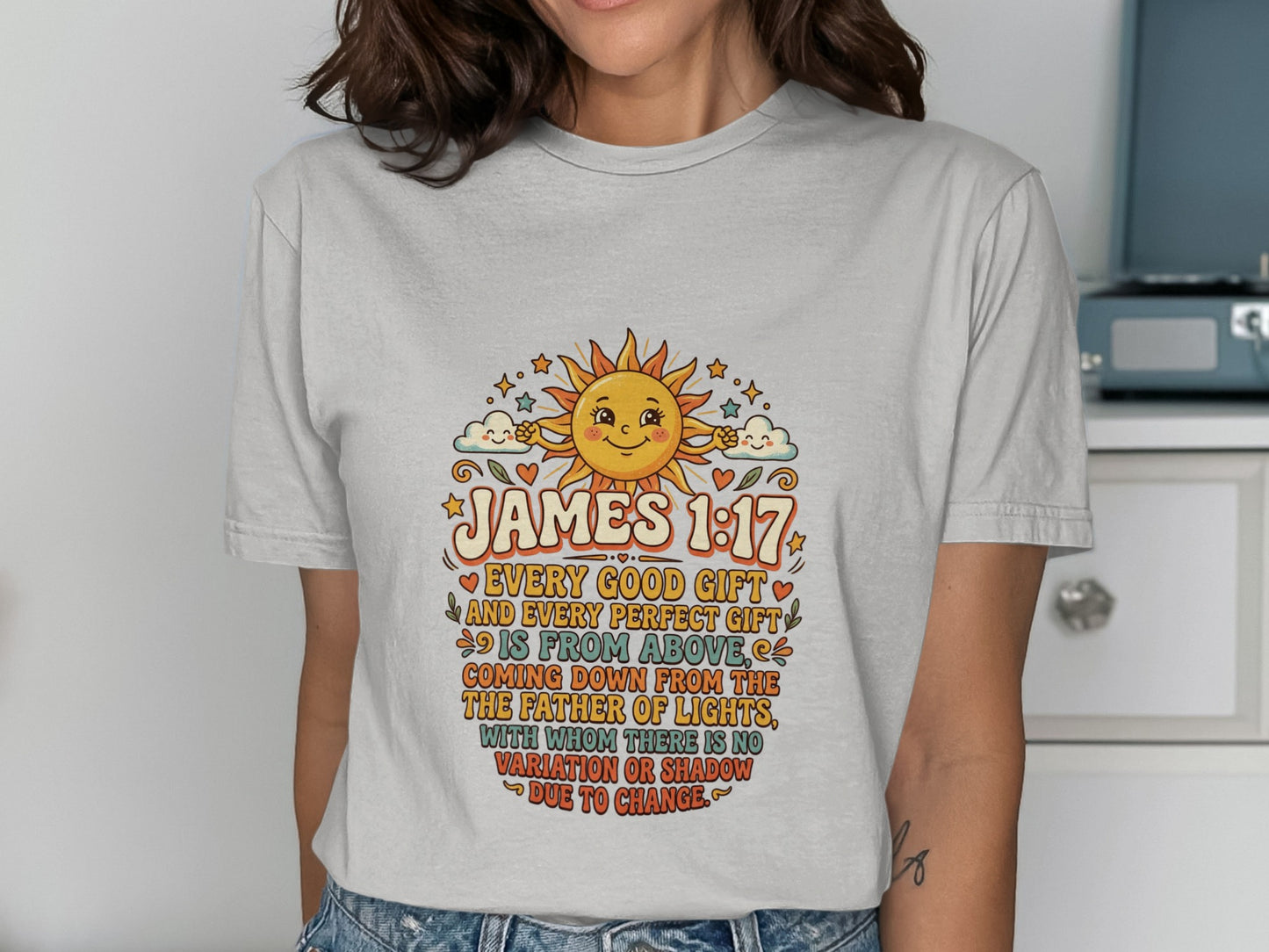 T-shirt with "James 1:17" scripture and sun graphic.