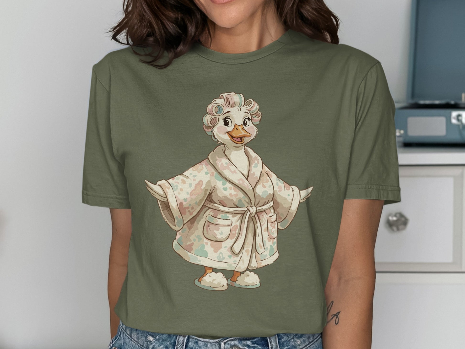 Duck in a robe and slippers with curlers in its hair.